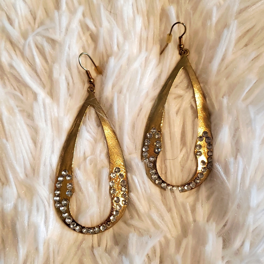 Stunning gold tear drop Statement earrings